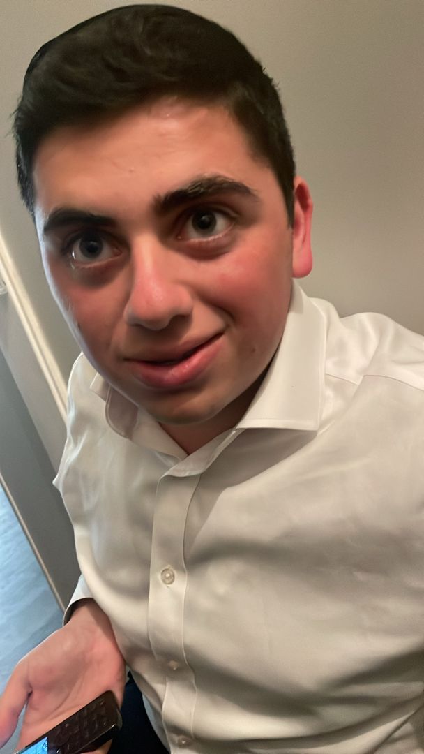 A client showing off a fresh cut